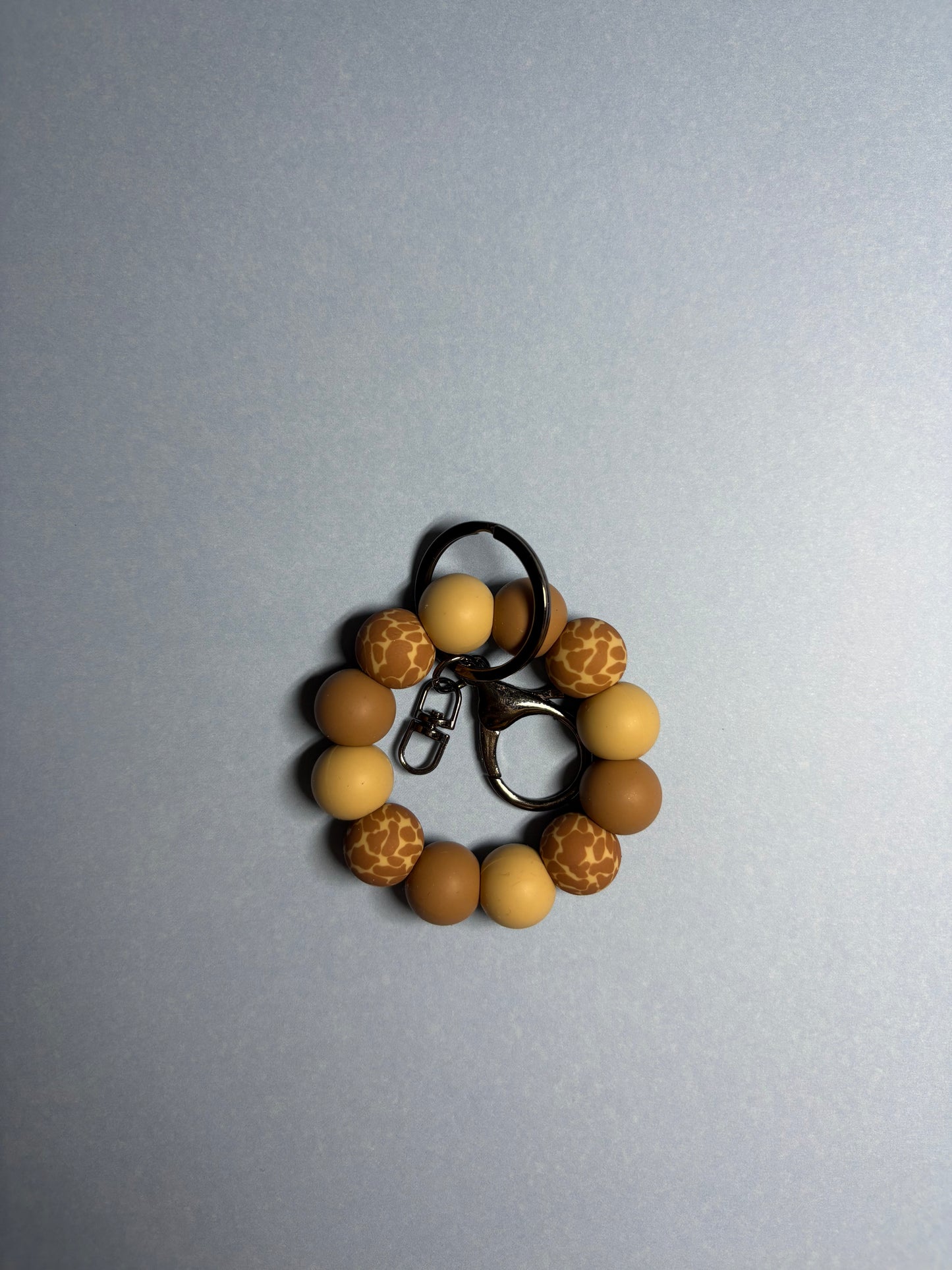 Mini brown giraffe wristlet