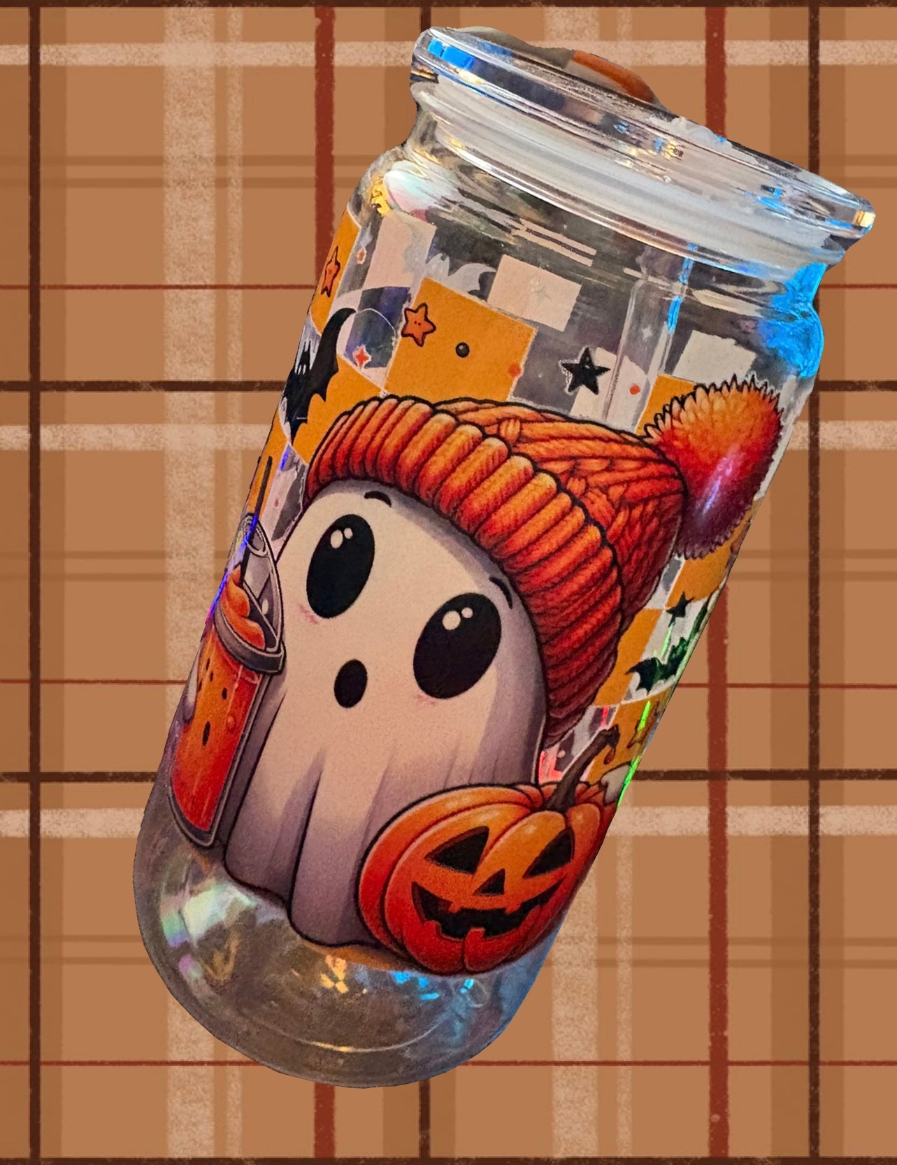 Plastic cup with Ghost cup wrap with a slight imperfection