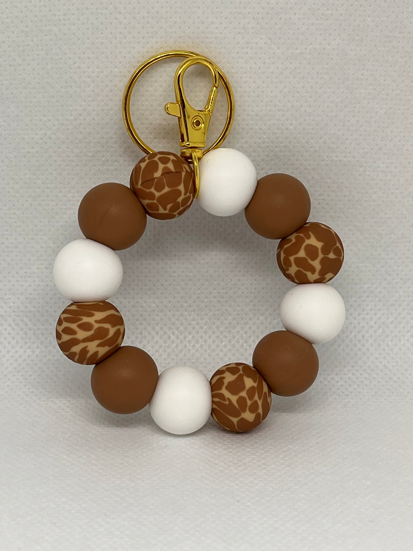 Mini brown giraffe wristlet